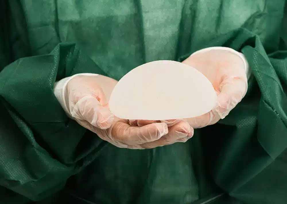 Breast augmentation with fat or implants